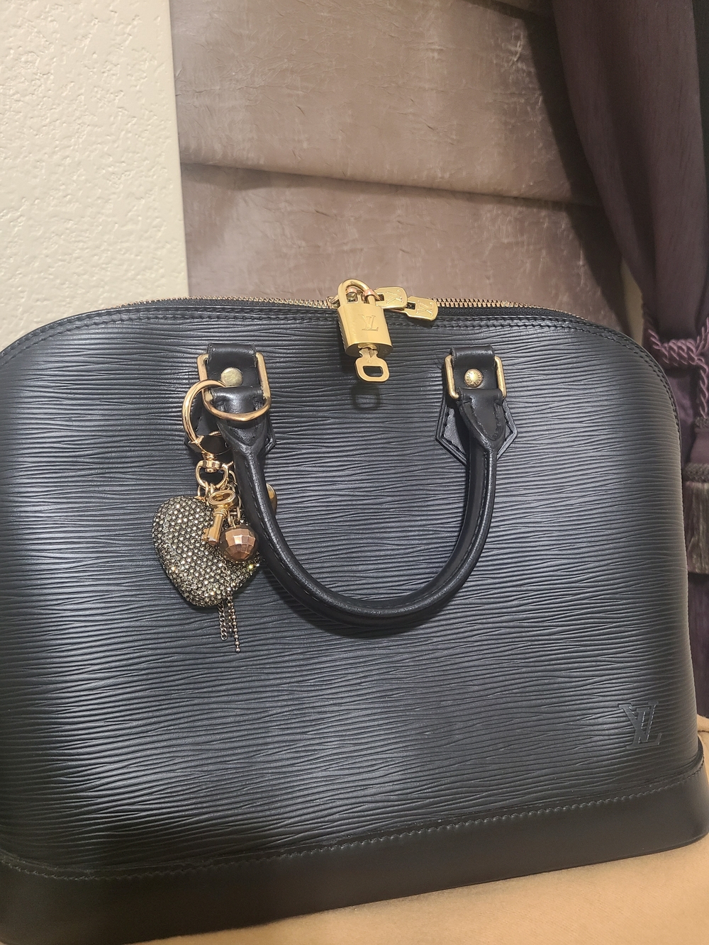 Louis Vuitton Alma PM in Epi leather
